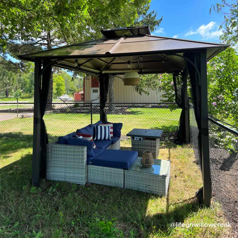 SUNJOY 10x12 Metal Hardtop Gazebo with Netting and Ceiling Hook.