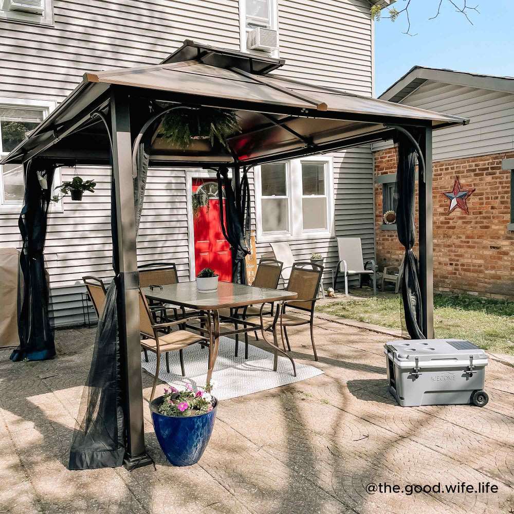 SUNJOY 10x12 Metal Hardtop Gazebo with Netting and Ceiling Hook.