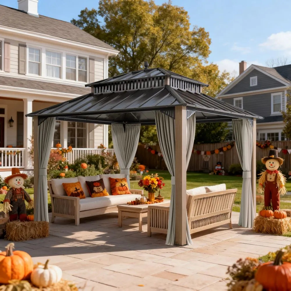Outdoor patio with gazebo, furniture, and Halloween decorations in a residential backyard.