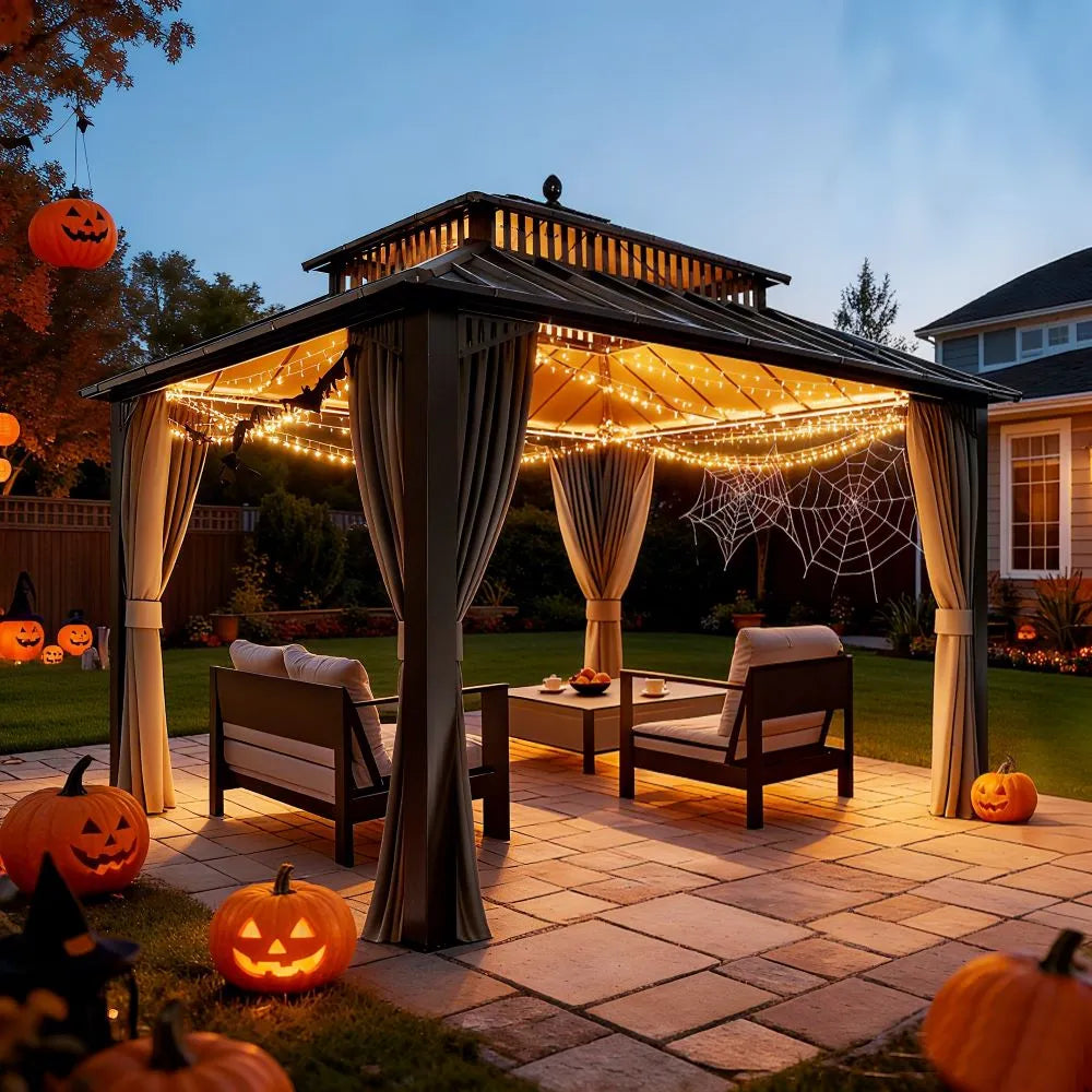 Outdoor gazebo with Halloween decorations including pumpkins and string lights.