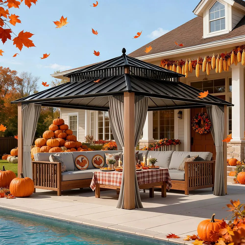Outdoor patio with gazebo, pumpkins, and autumn decorations in front of a house.