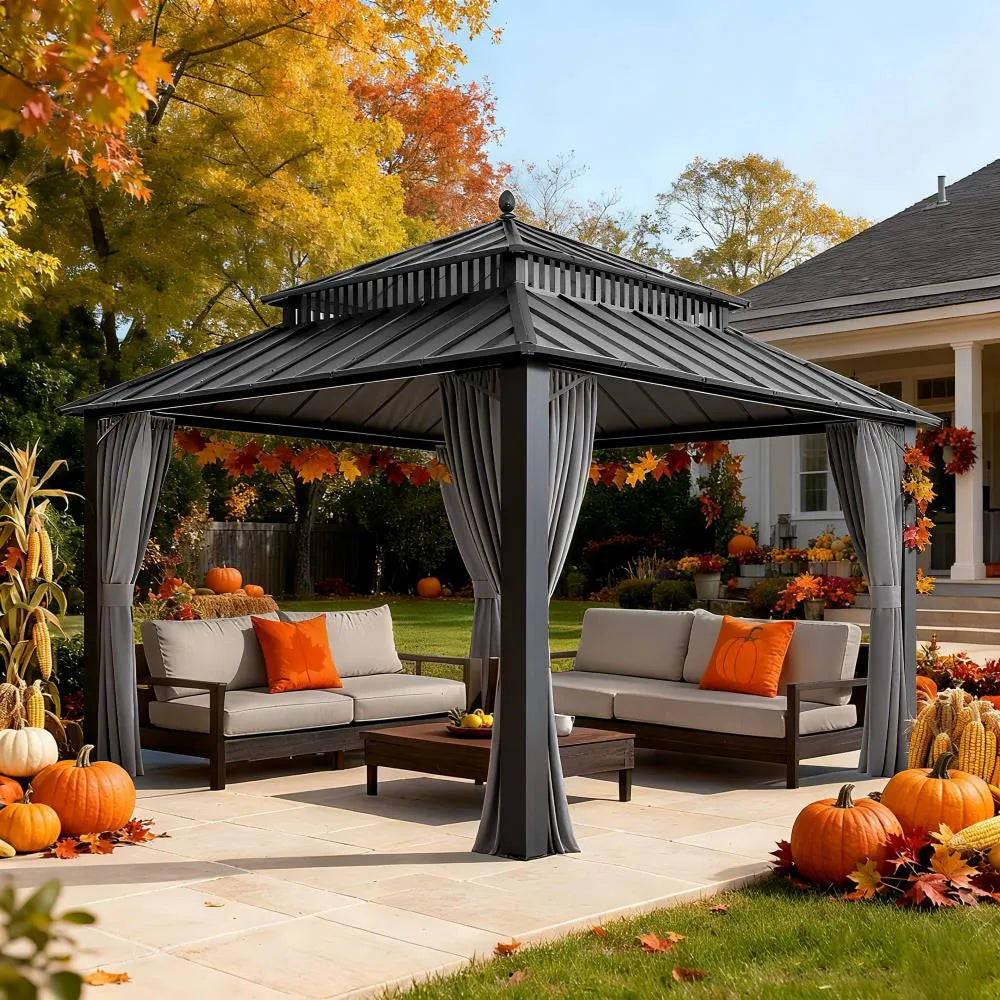 Outdoor patio with gazebo, furniture, and autumn decorations in a backyard setting.