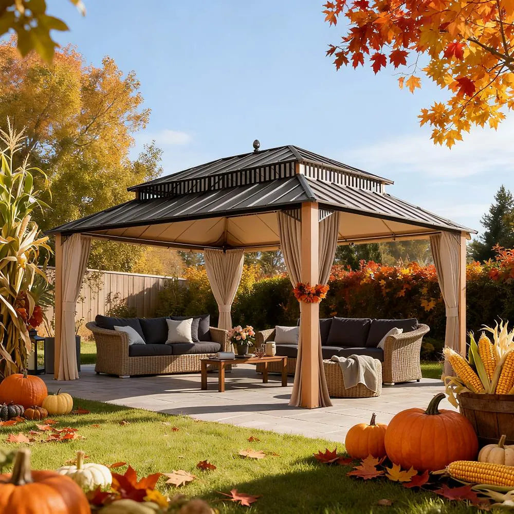 Outdoor gazebo with autumn decorations including pumpkins and corn on a patio.