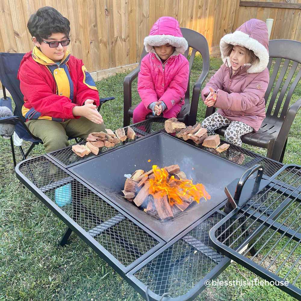 SUNJOY 38 Inch Large Outdoor Fire Pit with Adjustable Grill and Poker.