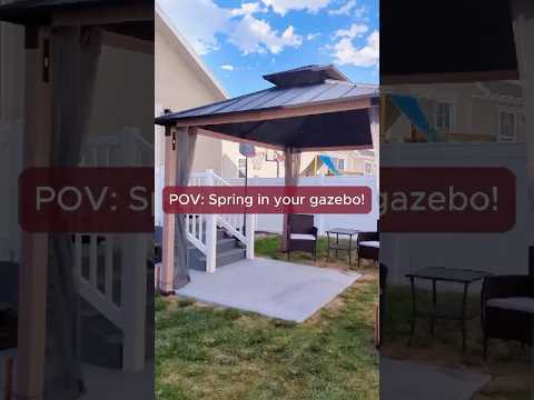SUNJOY Gazebo stand in a beautiful yard