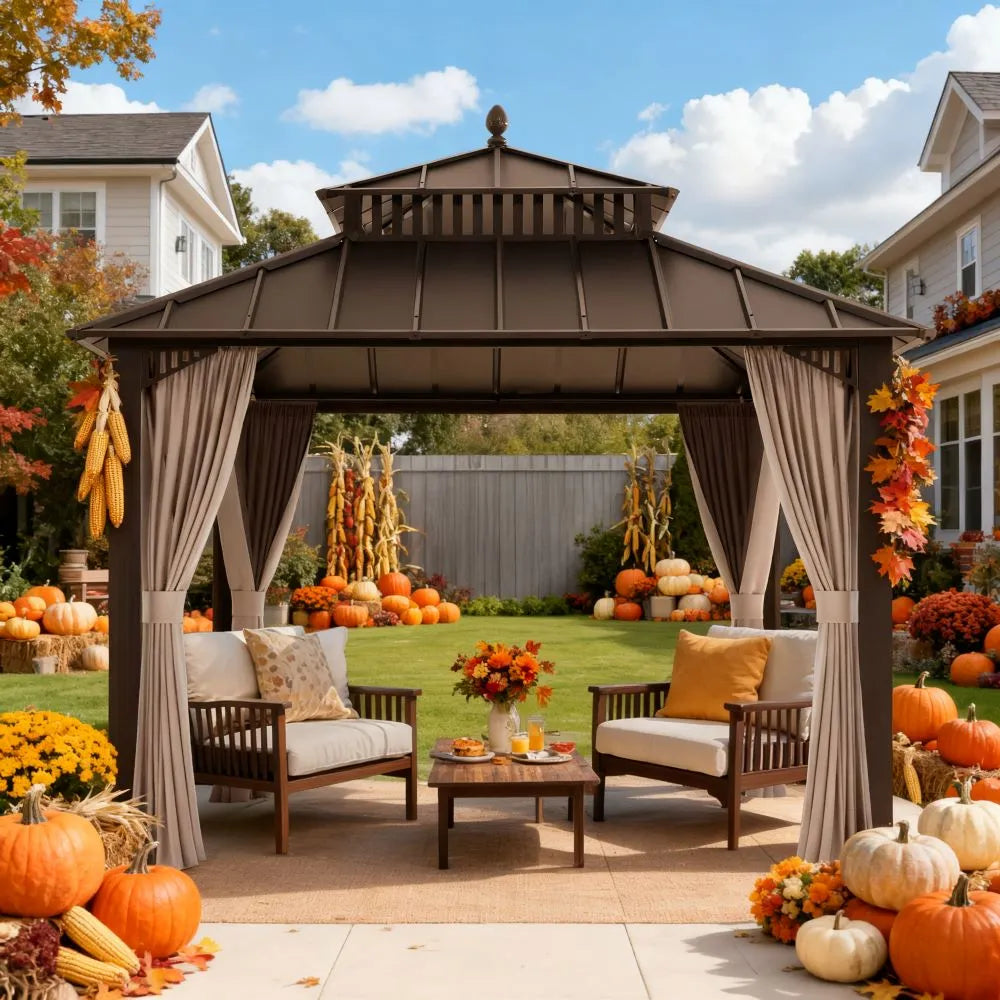 Outdoor gazebo with fall decorations including pumpkins and flowers in a residential backyard.