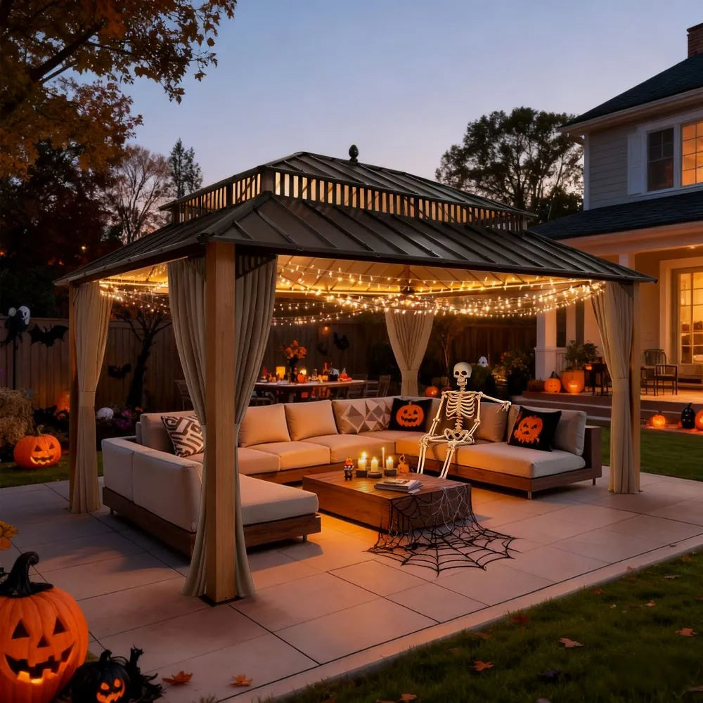 Outdoor patio with Halloween decorations, including a gazebo, couch, and pumpkins.