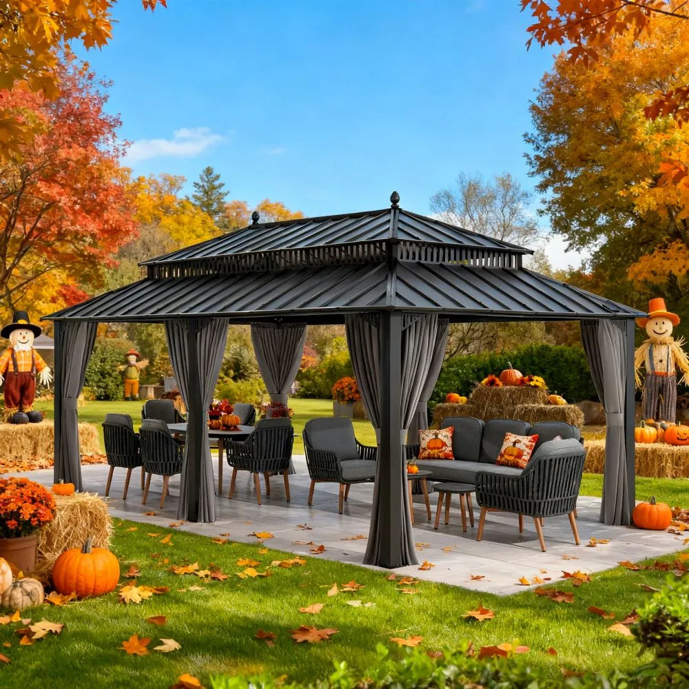 Outdoor gazebo with furniture and autumn decorations in a garden setting