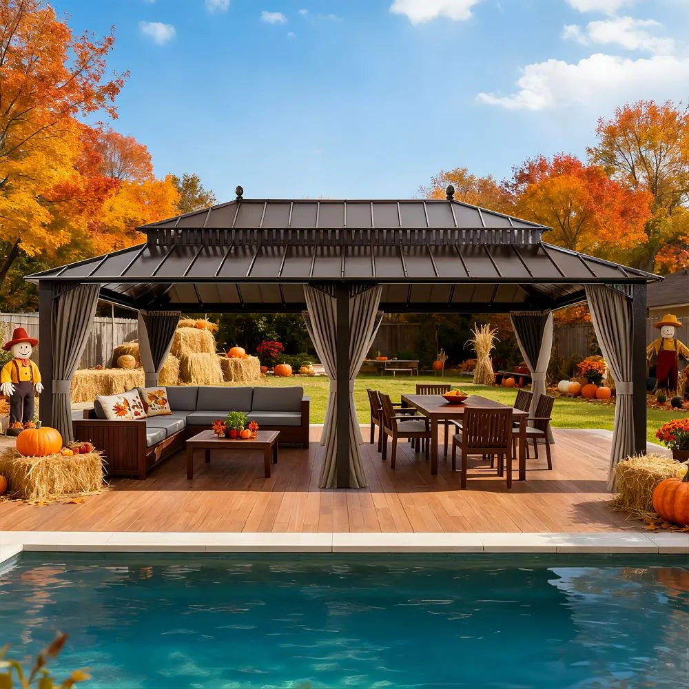 Outdoor gazebo with seating area by a pool, surrounded by autumn trees.