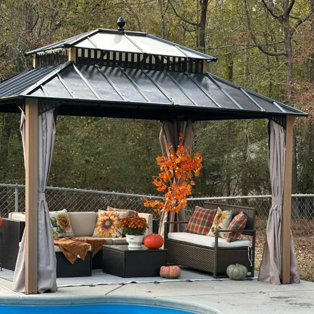 Patio gazebo with outdoor furniture and decorative elements near a pool