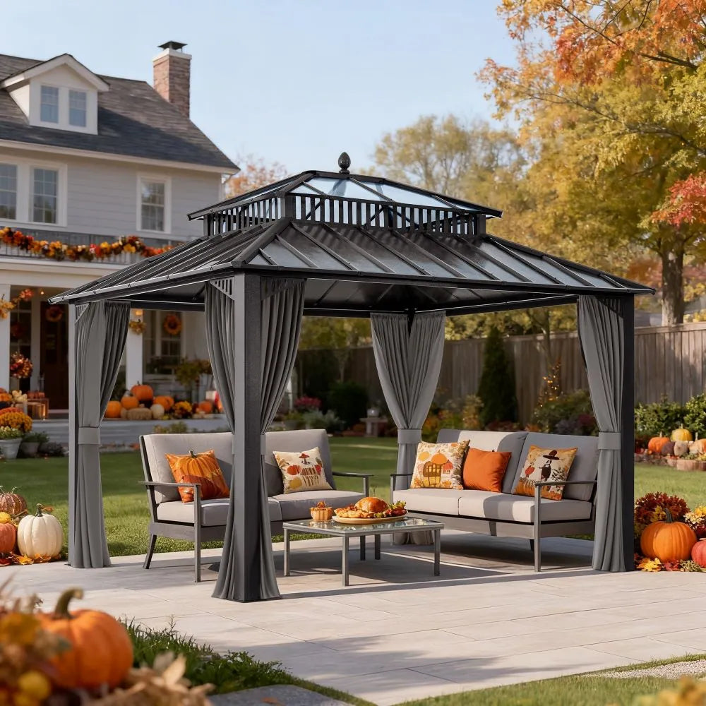 Patio gazebo with outdoor furniture and autumn decorations in a backyard setting.
