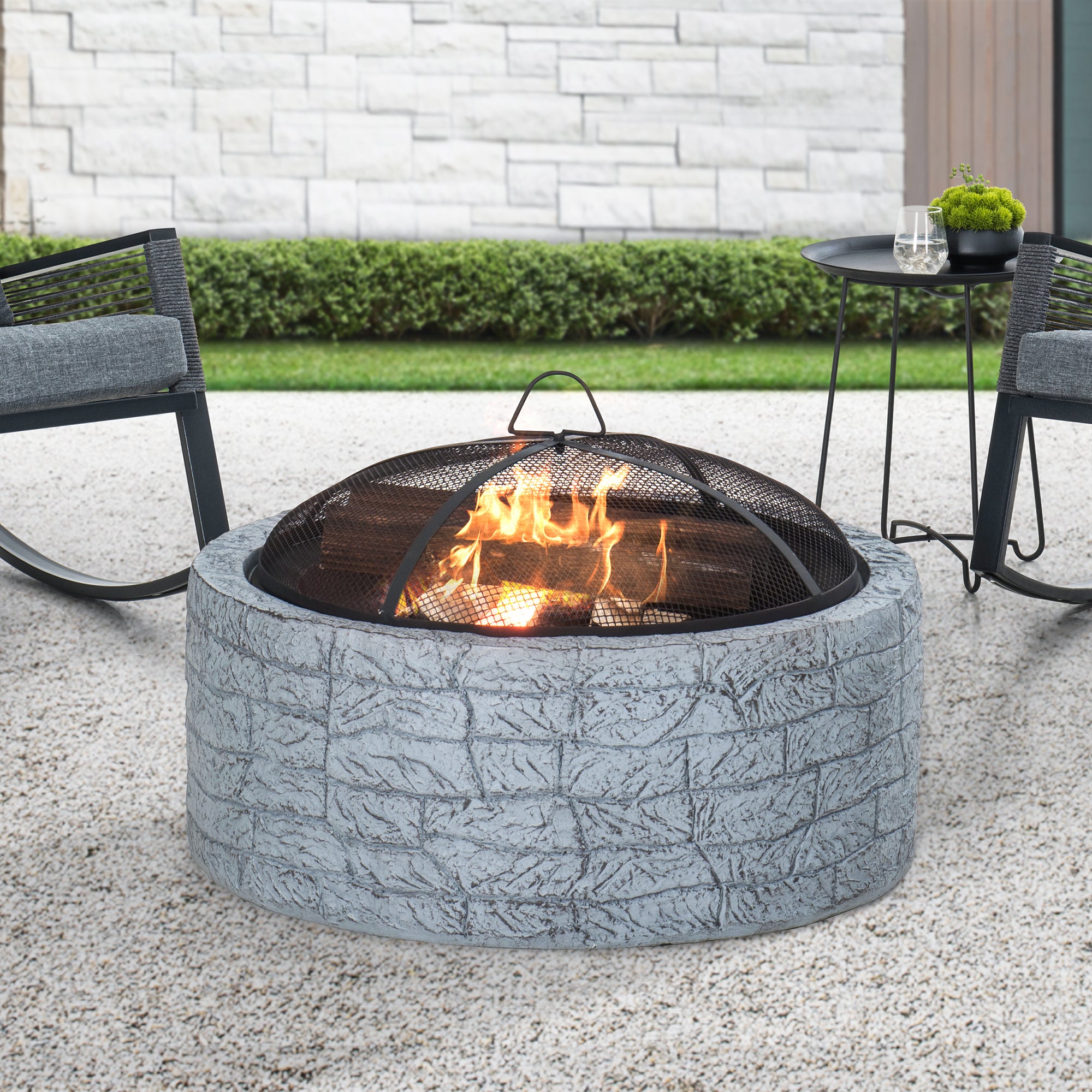 SUNJOY 26 Inch Small Outdoor Stone Firepit with Spark Screen and Poker.