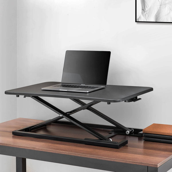Studio Space 29" Black Height Adjustable Folding Sit to Stand Ultra-Slim Desktop Riser for Monitor or Laptop.